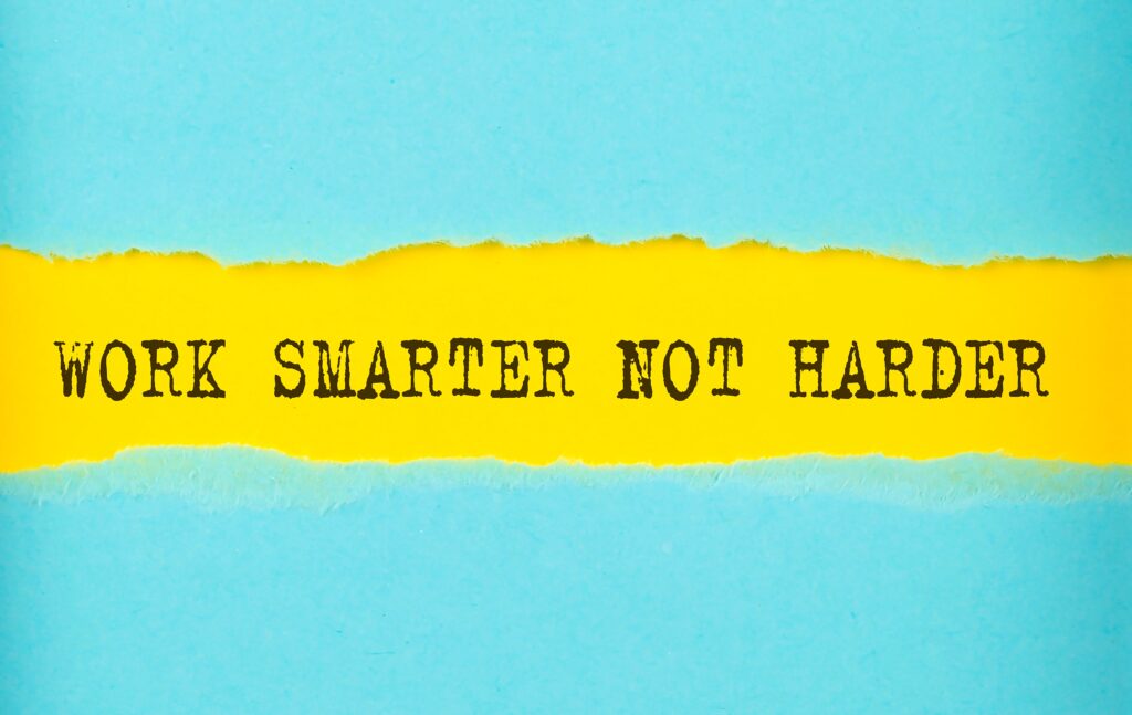 This is a blue and yellow sign that says "work smarter not harder"