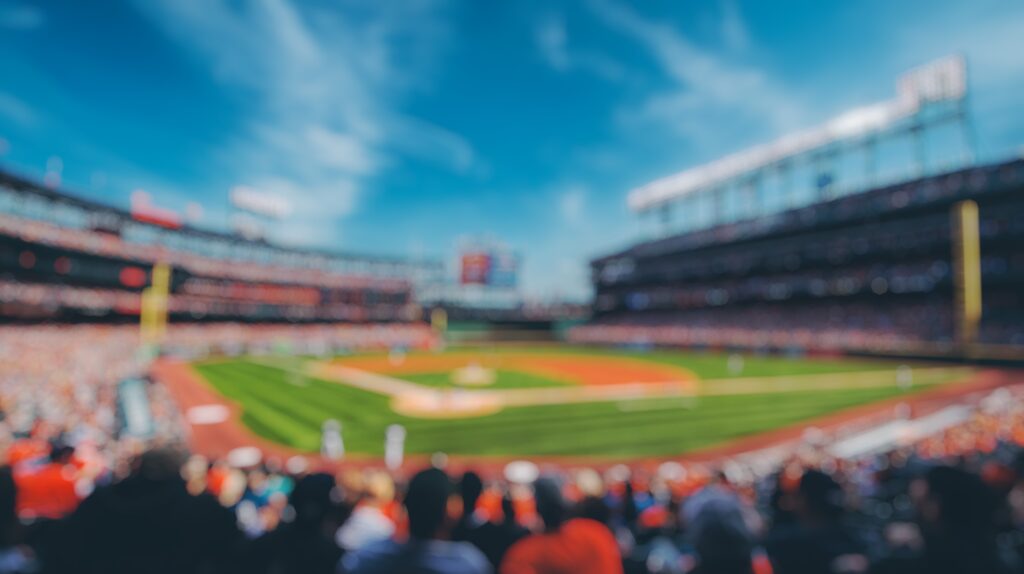 This is a blurry image from behind the plate at a baseball game in a major league stadium