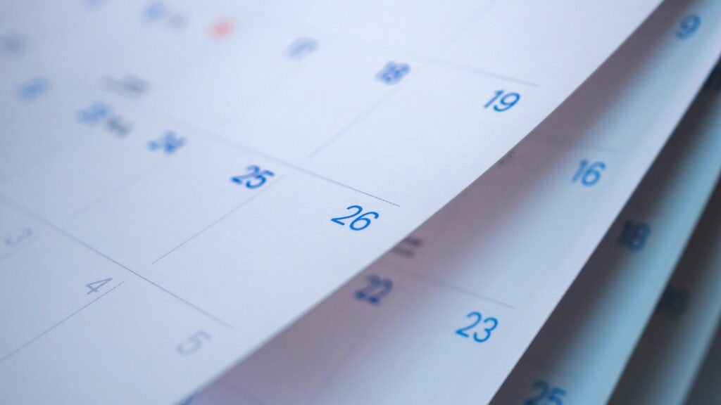 This is a partial image of a monthly calendar that is being flipped through.