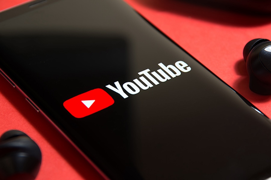 Photo of the YouTube logo on a phone