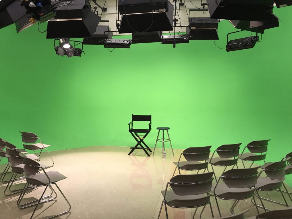 Photo of an interview setup with a green screen