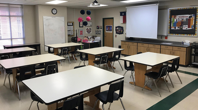 Photos of a newsroom with a lab style layout with large desks and a pull down screen