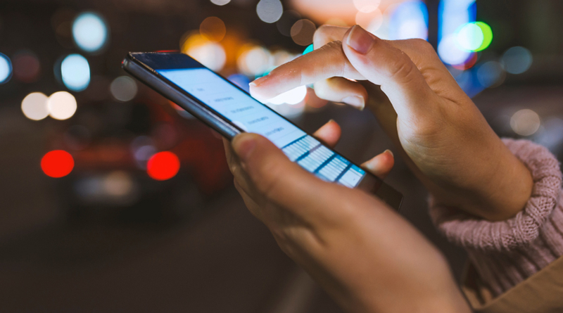 Photo of someone using her phone