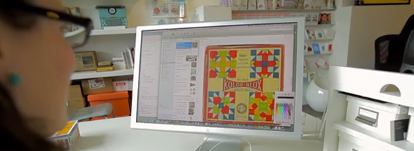 Photo of a woman working at a computer