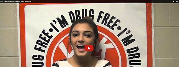 Thumbnail of a video of a girl with a poster behind her that says I'm Drug Free