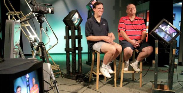 Photo of 2 men being interviewed