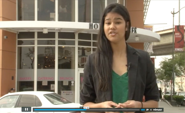 Screenshot from a video of a student giving a news broadcast