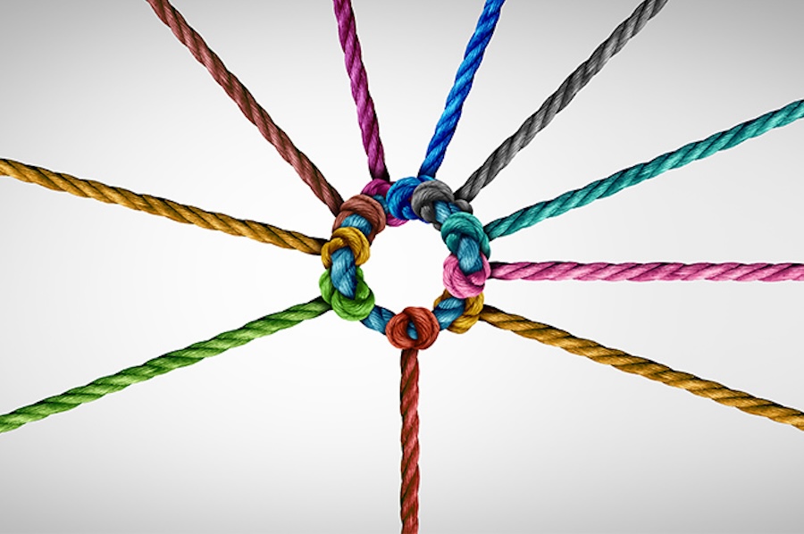 A photo of 10 colored ropes joined together around a central circle rope