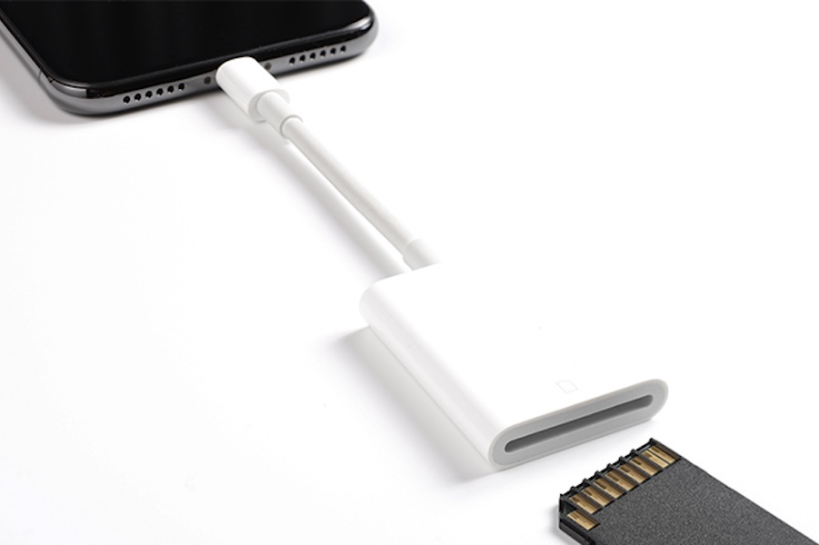 Photo of a phone plugged into a adaptor