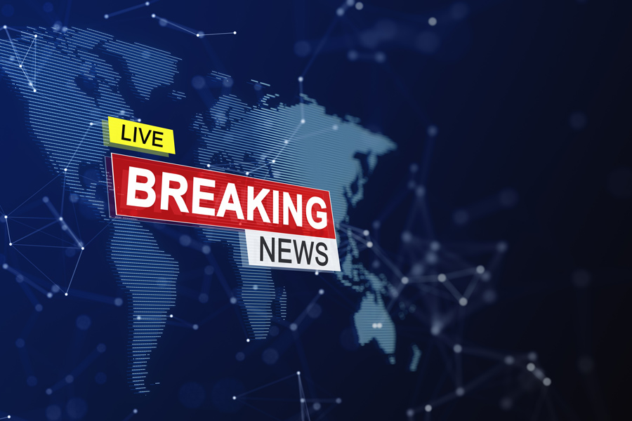 This is an image of a map in the background with the words Live Breaking News written over top of the map.