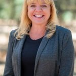 melissa cameron headshot with background blurred