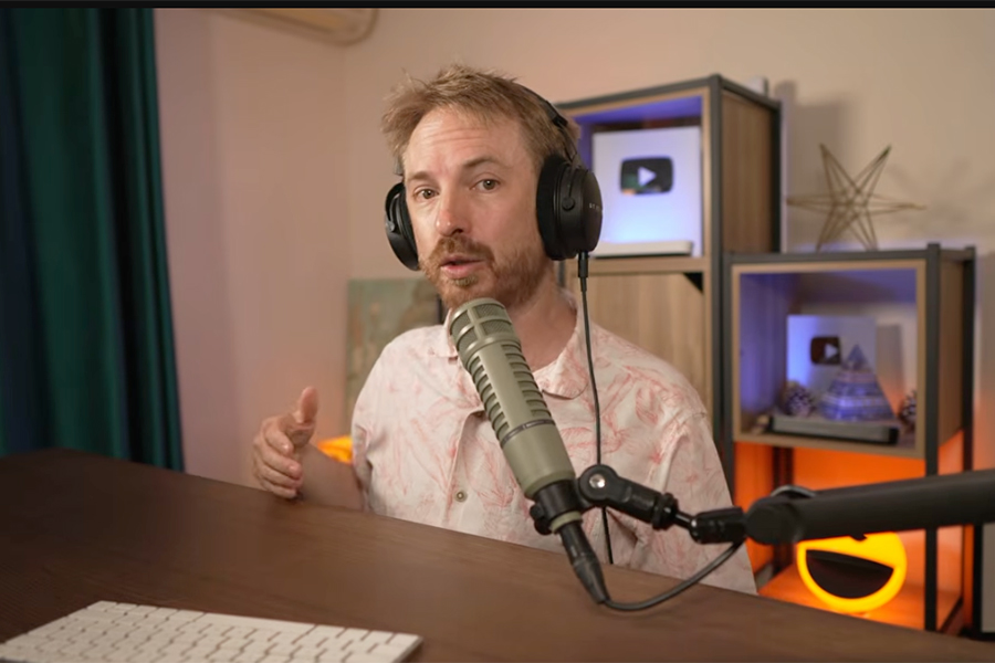 Decorative image of a podcaster speaking.